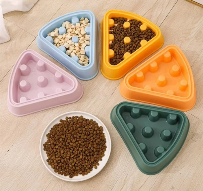 Interactive Food Dispenser For Dogs In Triangular Shape